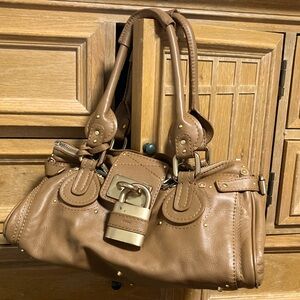 Chloe medium paddington camel color leather handbag.